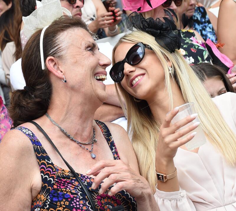 Two ladies enjoying their day at Brighton Races