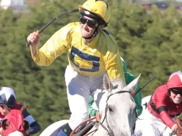 Jockey celebrating