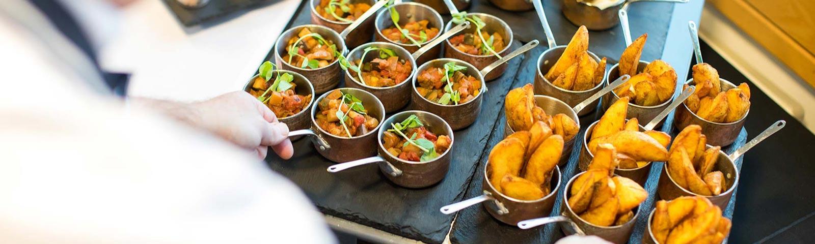 Chef preparing dishes for hungry guests.